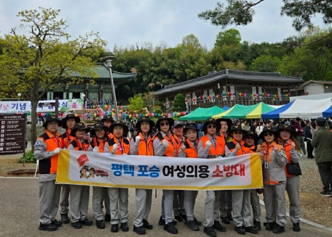 평택시 포승읍 남녀의용소방대, 수도사 연등 행사의 안전을 책임지다
